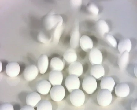 Pouring white pills Stock Footage 589315