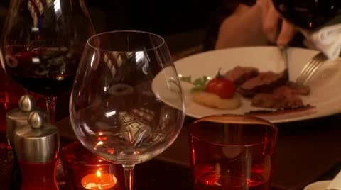 Pouring wine into a glass Stock Footage