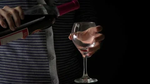 Pouring wine into glass Stock Footage 10600864