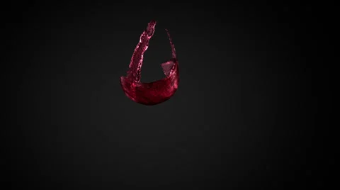 Pouring wine or cherry juice into invisible glass, isolated on black background Stock Footage 25254071