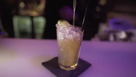 Pouring Yellow Cocktail Video stock 84052572
