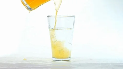 Pouring yellow squash in water Stock Footage 87214801