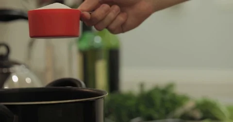 PouringSaltIntoPot Stock Footage 88838669