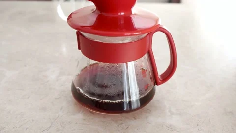 Pourover. V60. Coffee filter dripping into glass cup. Coffee craftsmanship Vídeo Stock 139962175