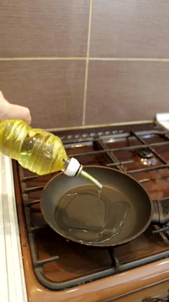 https://images.pond5.com/pours-frying-oil-hot-frying-footage-169027397_iconm.jpeg
