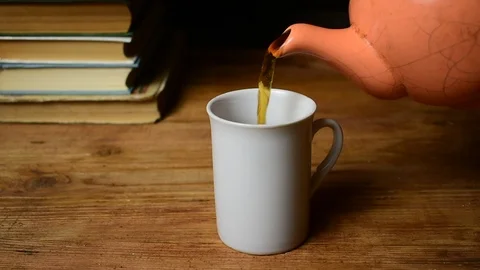 Pours tea Stock Footage 108764223