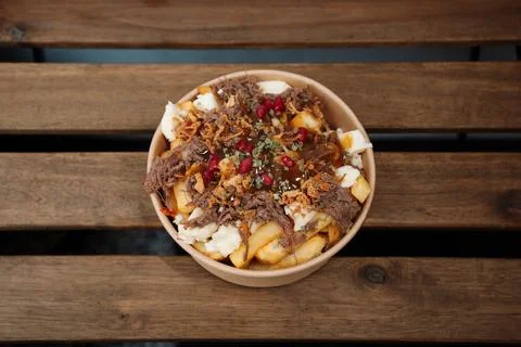 Poutine fries with chees and pulled pork Stock Photos