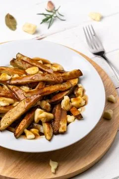 Poutine vertical portrait view. Stock Photos