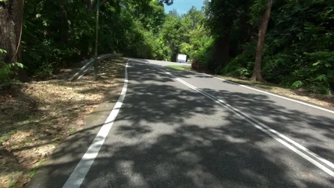 POV action camera shot riding a scooter, backpacking on Langkawi. Smooth Stock Footage 256902011