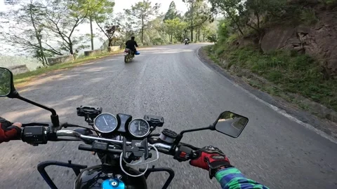 POV action camera shot riding a motorbike in Pakistan, mountains of Kashmir. Stock Footage 269793354