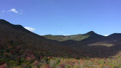 POV Aerial Drone Of Clouded Mountains In the Fall with Foliage Stock Footage