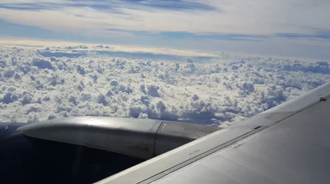 POV-Airline descending toward solid cumulus cloud layer with stratus above Stock Footage 59171290