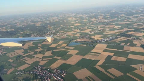POV Airplane Window View Turning Right over Munich Bavarian Land - Jul 10 2026 Stock Footage 339725161
