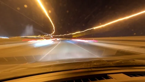 POV angle Timelapse hyperlapse of driving a car on a busy highway at night Stock Footage 126509859