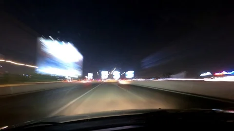 POV angle Timelapse hyperlapse of driving a car on a busy highway at night Stock Footage 126511788