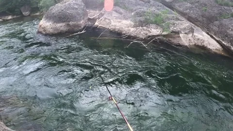 POV Angler Casting into a Rocky River Pool Stock Footage 346884989