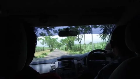 POV In the Backseat driving through Java, Indonesia Stock Footage 131152042