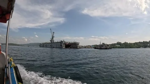 POV Boat Passing Indian Navy Floating Dry Dock, Port Blair, Andaman Islands Stock Footage 339371663
