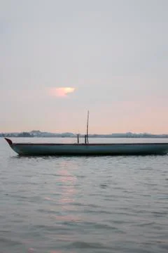 POV for boat sailing in river in Batam, Indonesia during sunset and golden ho Stock Photos