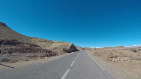 POV Camera car on empty mountain road 库存影片 128648549
