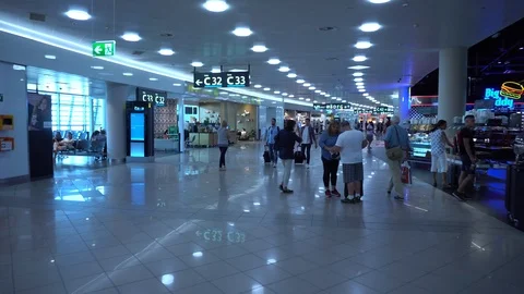 POV. Camera moves through the terminal of the international airport.  4K. Video stock 94960290