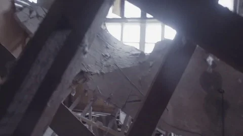 POV camera view on ruins in abandoned factory building destroyed by earthquake Stock Footage 80311265
