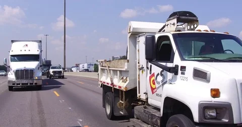 POV car and truck traffic driving on busy highway 401 in Ontario Canada Stock Footage