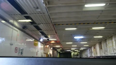 POV of car interior view embarking on Ferry at ferry terminal 動画素材 60603929