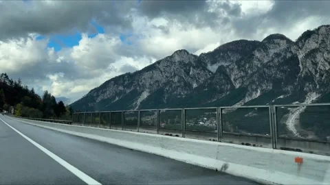 POV car moving by Dolomites, Austrian Alps. Vacation, travelling by car Stock Footage 255886868