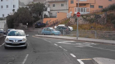 Pov of a car riding through the small city in Tenerife, spain Stock Footage 112288966