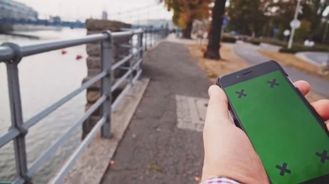 POV: Close-up of Male Hand using Smartphone. Chromakey. SLOW MOTION 120 fps. Stock-Footage 67223408
