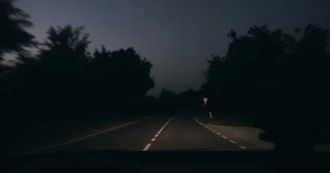 POV close-up view from inside car driving along atmospheric small early morning Stock Footage 150572045