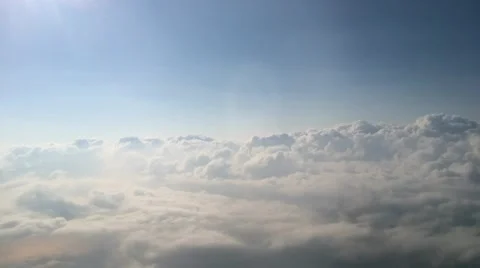 POV of Clouds from Passing Aircraft Stock Footage 48542596