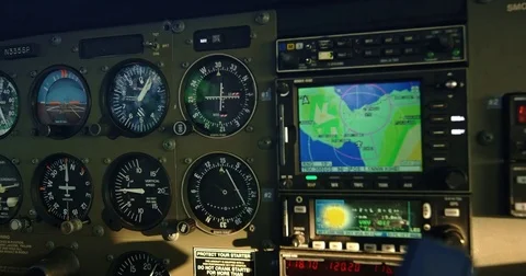 POV cockpit view of small plane instruments and flight controls Stock Footage 75920242