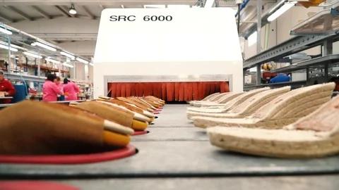 POV Conveyor Belt of Shoes at a Factory Stock Video Pond5