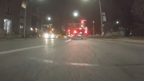 POV dark low angle drive at night on city of Toronto streets Stock Footage 99398109
