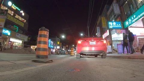 POV dark low angle drive at night on city of Toronto streets Stock Footage 99405560