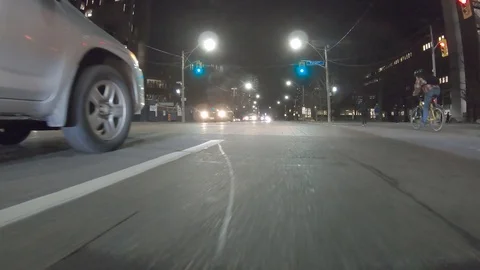 POV dark low angle drive at night on city of Toronto streets Stock Footage 99406390