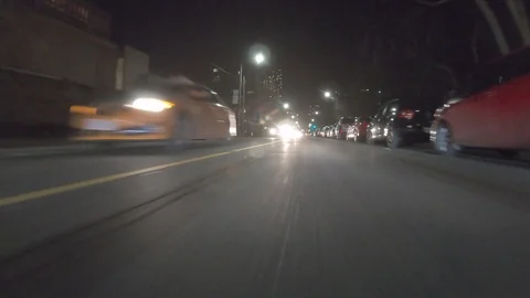 POV dark low angle drive at night on city of Toronto streets Stock Footage 99406493
