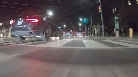 POV dark low angle drive at night on city of Toronto streets Stock Footage 99406976
