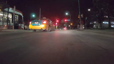 POV dark low angle drive at night on city of Toronto streets Stock Footage 99407442
