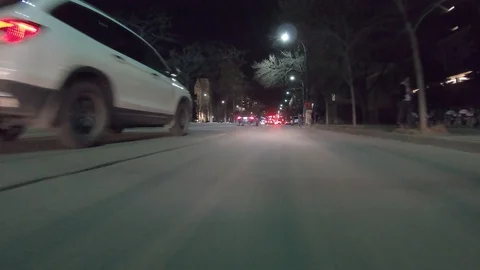 POV dark low angle drive at night on city of Toronto streets Stock Footage 99407474