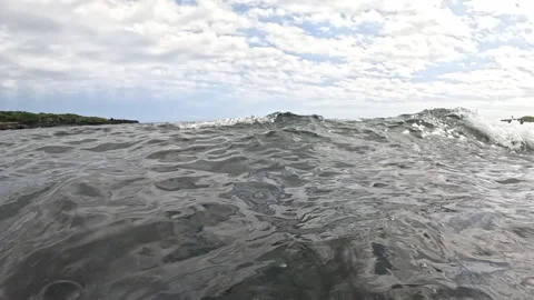 POV Diving into and Below Coastal Ocean Waves on the Hawaiian Shoreline Stock Footage 316635008