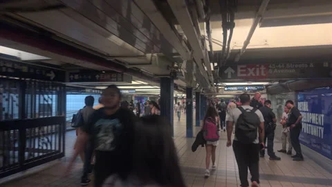 POV Down Long Corridor in 42nd St-Port Authority Station Toward the Bus Terminal Stock-Footage 347928305
