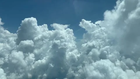 POV - Drifting through beautiful clouds. Real view from aircraft. Stock Footage 276767218