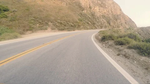 POV Drive: Navigating winding, climbing cliffside roads in Big Sur Stock Footage 97614275