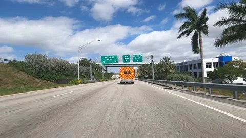 POV Drive over a highway behind an ambulance car - MIAMI, FLORIDA - FEBRUARY 15 Stock Footage