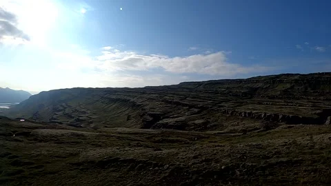 POV drive past sharp turn road signs in Icelandic highlands Stock Footage 333902682
