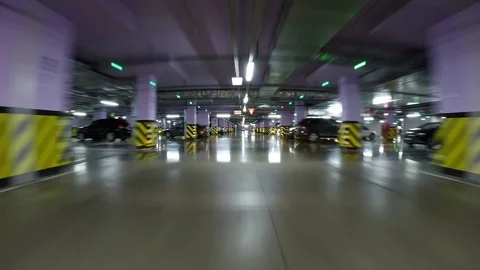 Pov drive through underground parking in city, real time. Underground Parking Stock Footage 80926979