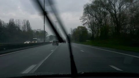 POV of driver driving in highway under heavy rain Stock Footage 98010628